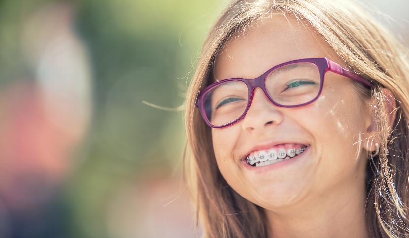 A child with glasses smiling
AI-generated content may be incorrect.